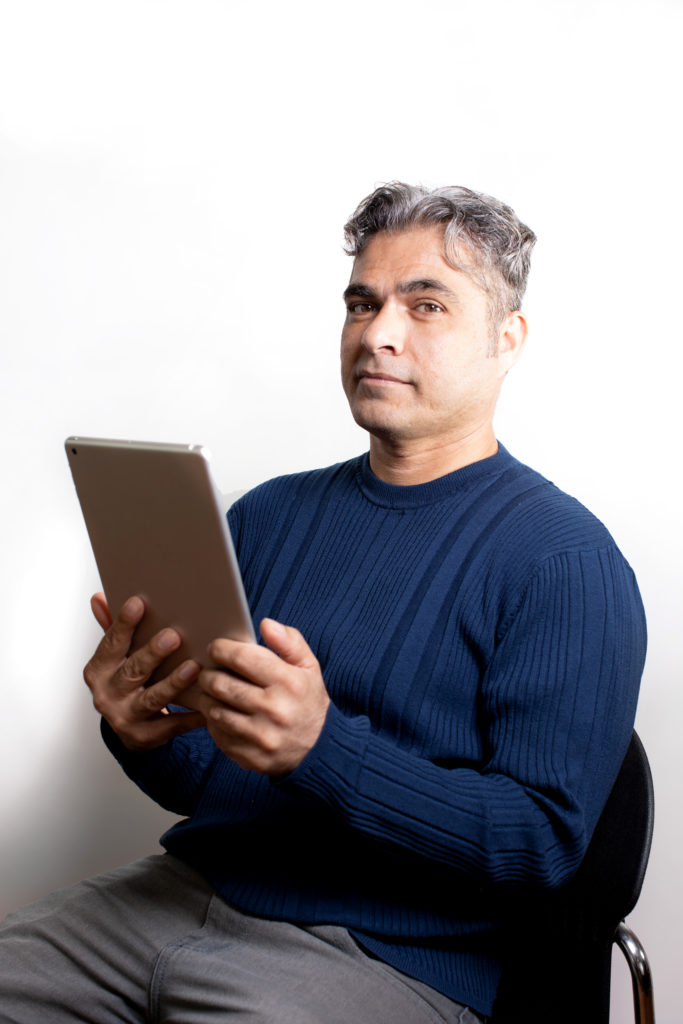 Man holding tablet